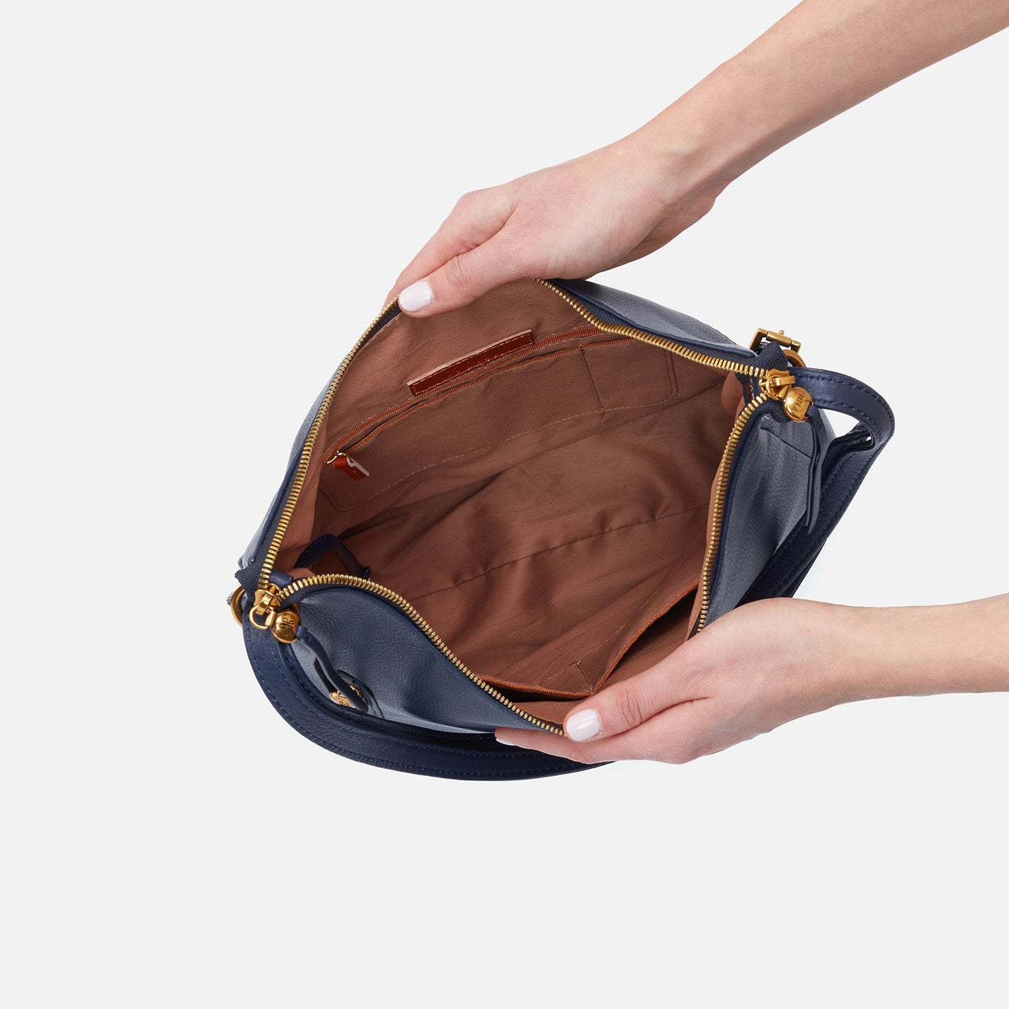 Merrin Convertible Backpack in Pebbled Leather - Black – HOBO